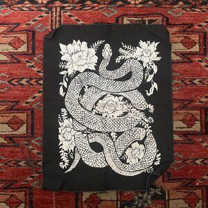 Backpatch canvas with snake and flowers